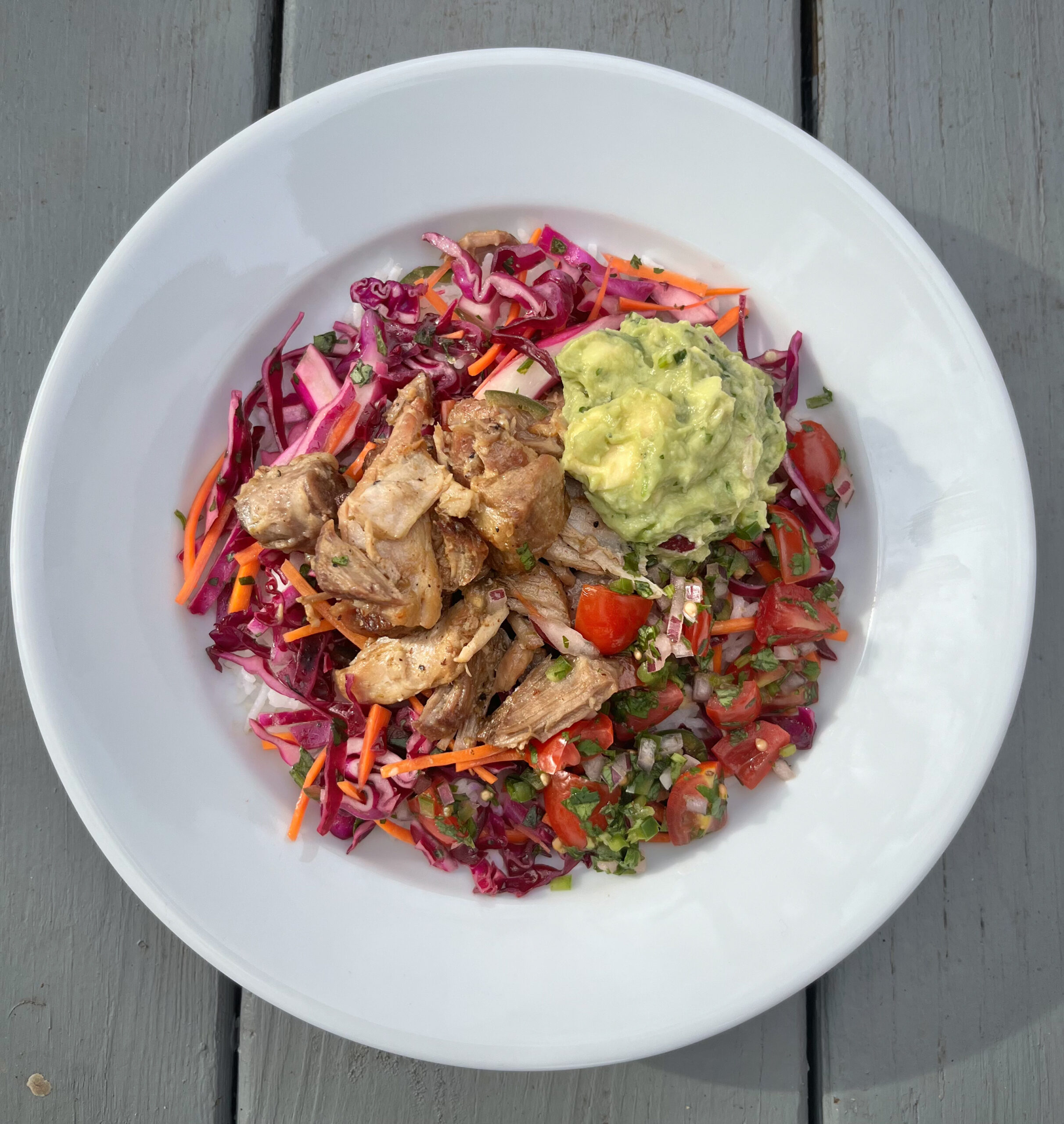 Chicken Burrito Bowl with Spicy Citrus Slaw, Pico de Gallo, Guacamole, & Cilantro Cauliflower Rice 